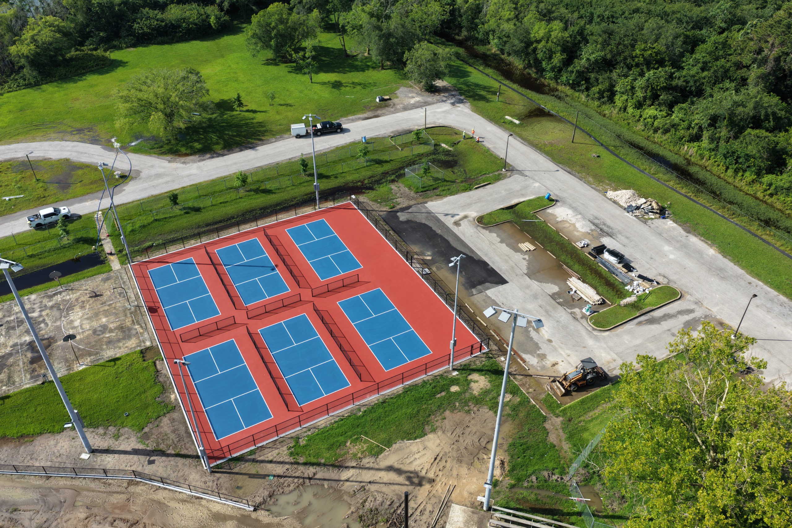 Arial image of  pickleball court painting and progress